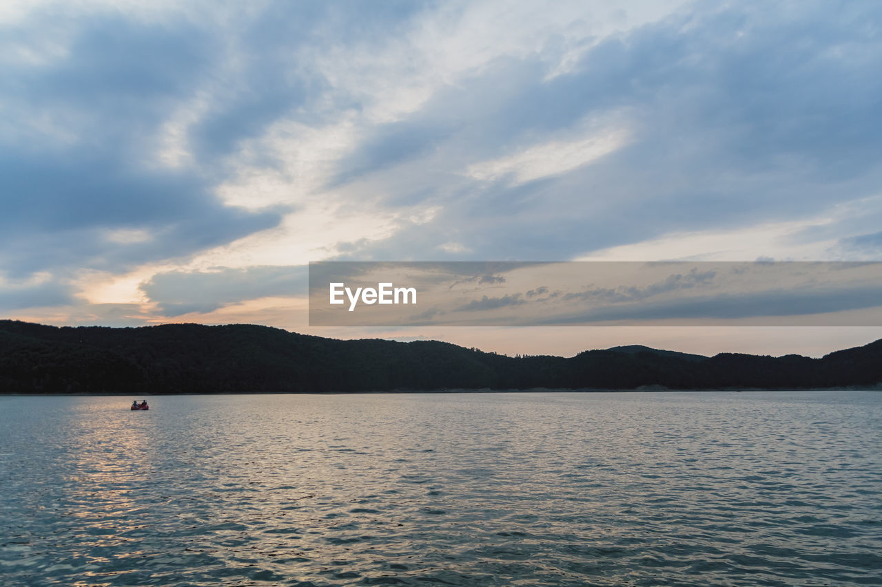 SCENIC VIEW OF SEA DURING SUNSET