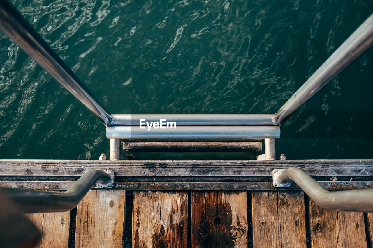 water, wood, nautical vessel, blue, sea, nature, railing, no people, transportation, day, high angle view, pier, vehicle, outdoors, mode of transportation, deck, boat deck