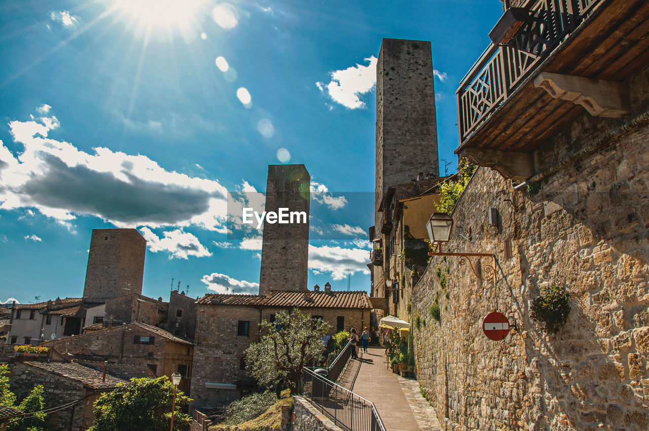 San gimignano, italy. street and towers in a sunny day at san gimignano, an amazing medieval town.