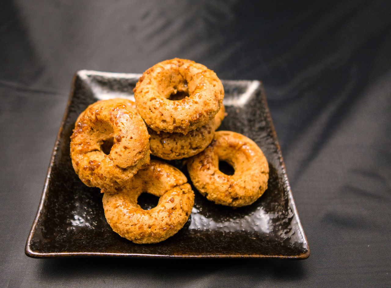 Close-up of donuts on plate