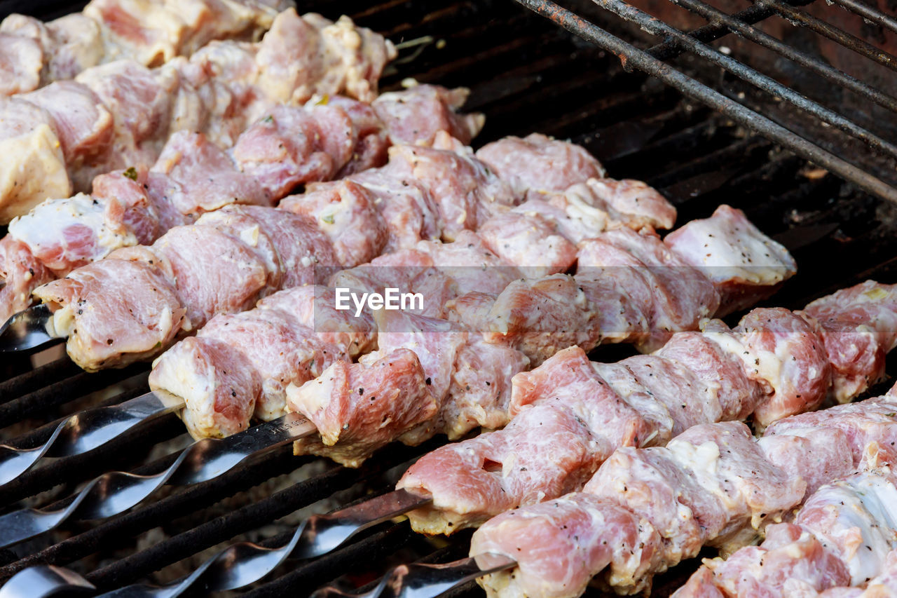 Close-up of meat on barbecue grill