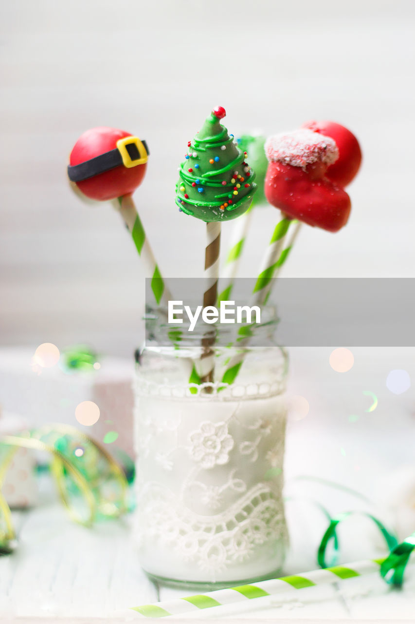 Christmas decorated cake pops, holiday background