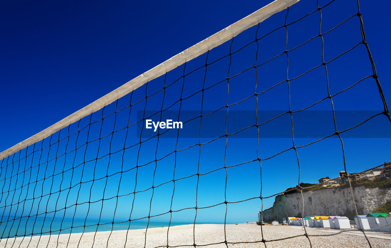 LOW ANGLE VIEW OF FENCE AGAINST CLEAR SKY