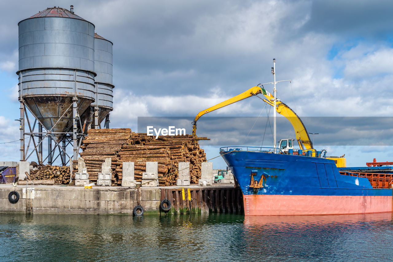 COMMERCIAL DOCK AGAINST SKY