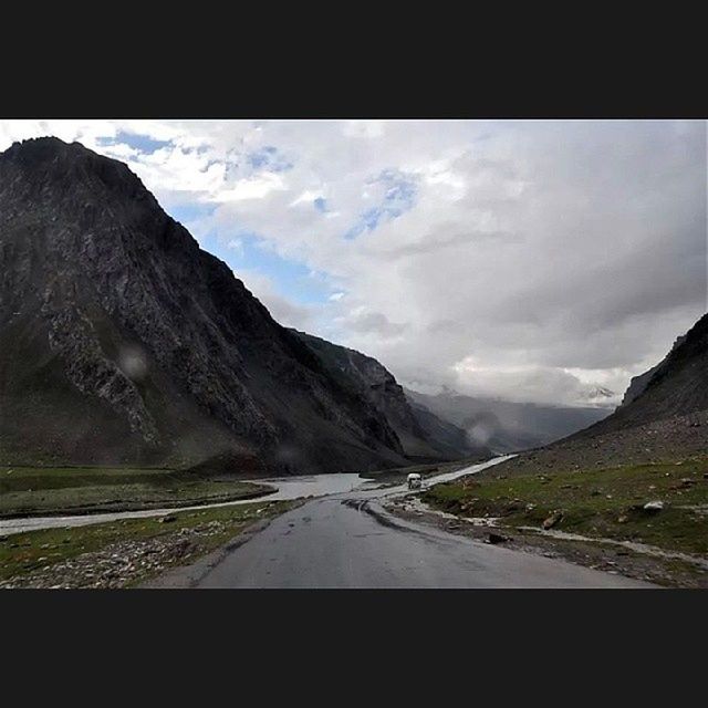 ROAD PASSING THROUGH MOUNTAINS