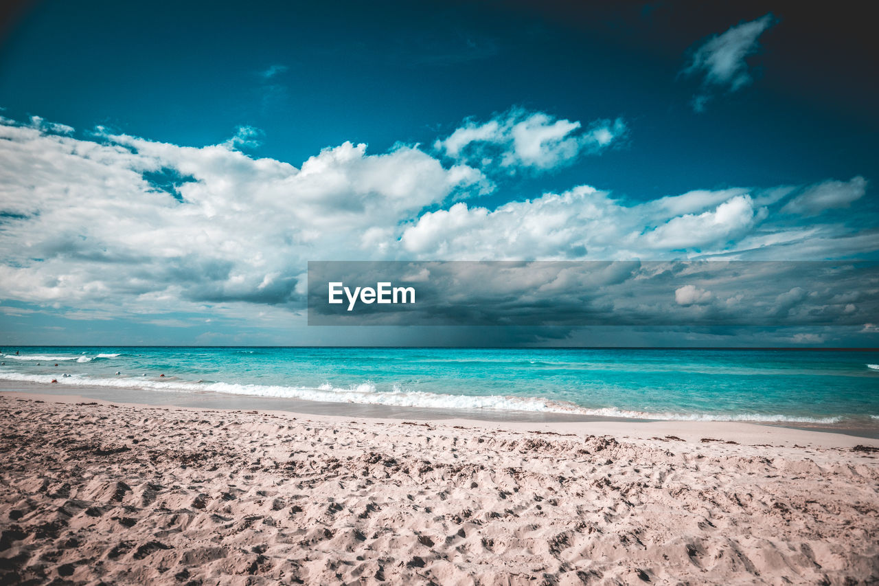 Scenic view of beach against sky