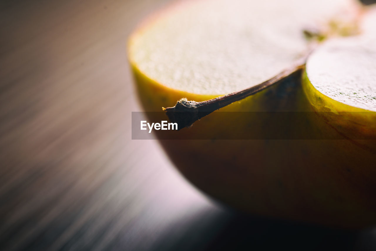 HIGH ANGLE VIEW OF BANANA ON TABLE