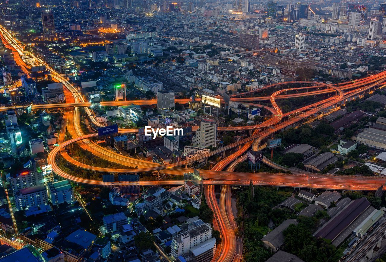 High angle view of light trails on road at night