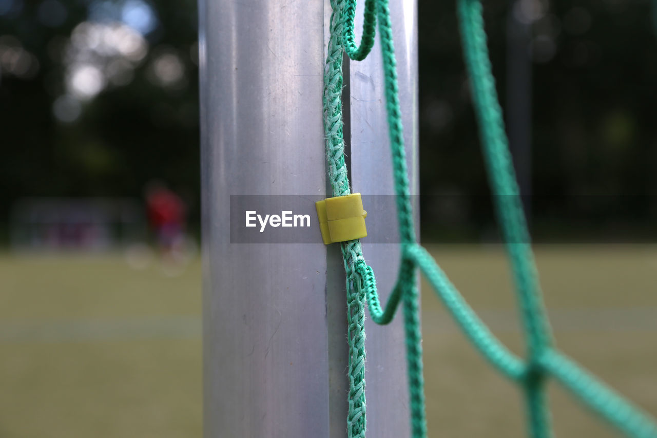 Close-up of net in soccer field