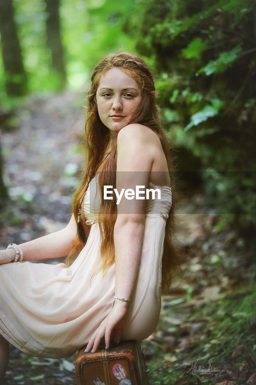 PORTRAIT OF BEAUTIFUL WOMAN IN FOREST