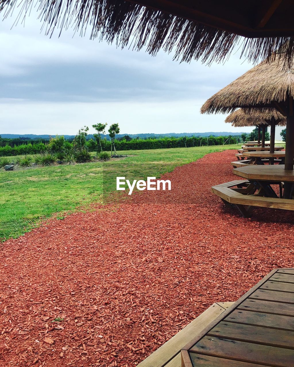 Scenic view of farm against sky