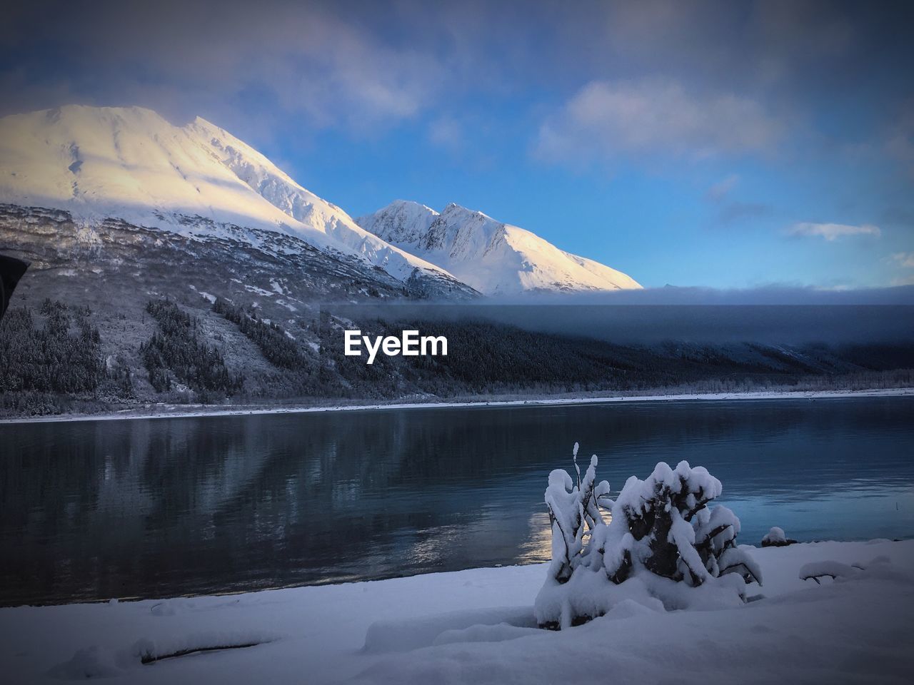 Scenic view of snow covered mountains