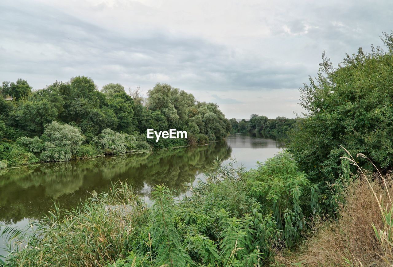 Scenic view of river against sky