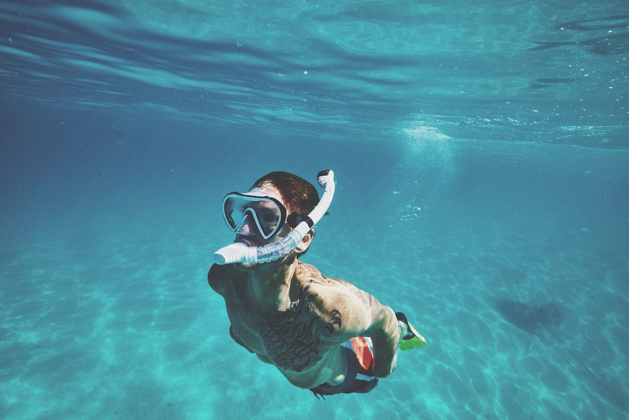 Man scuba diving in sea