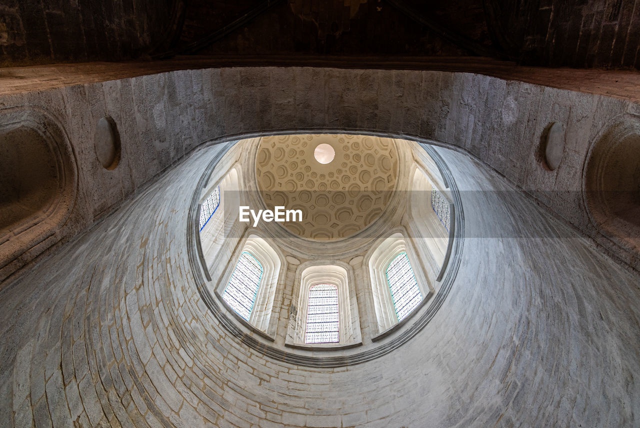 Direcly below view of the dome of the chapel of st. vincent ferrer in the cathedral of vannes. 