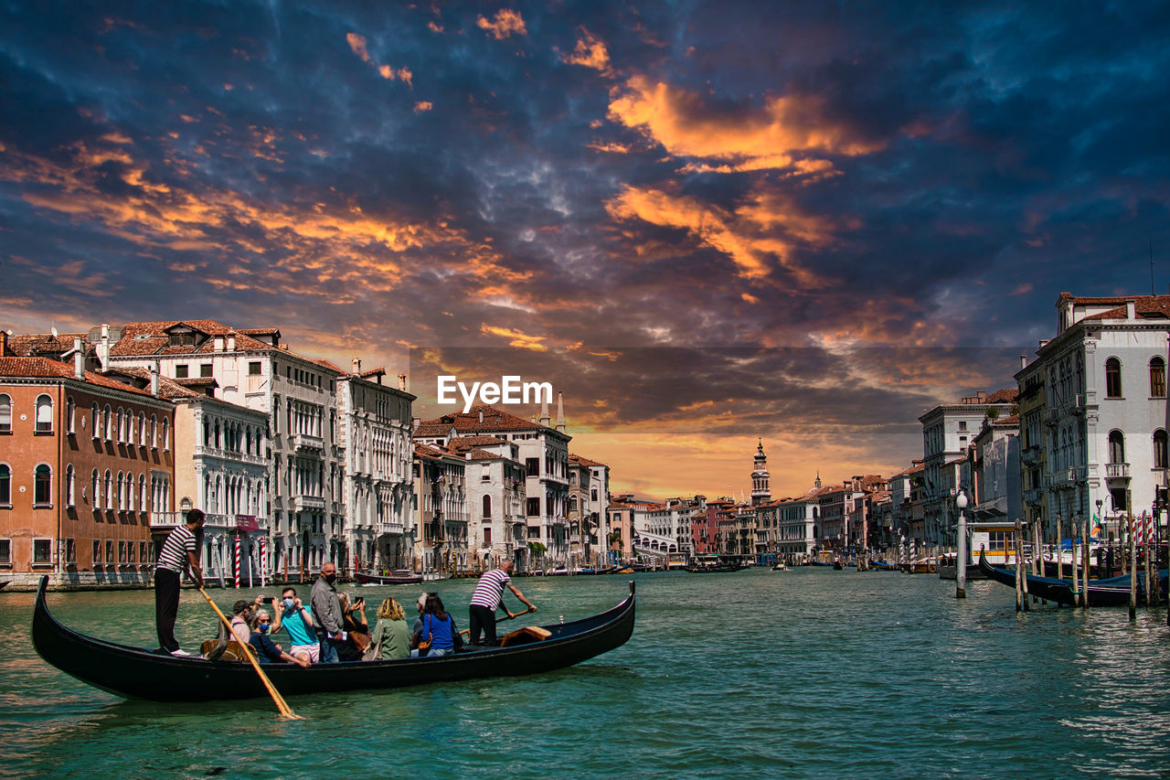 Gondolas at sunset with the grand canal empty during the covid period in venice