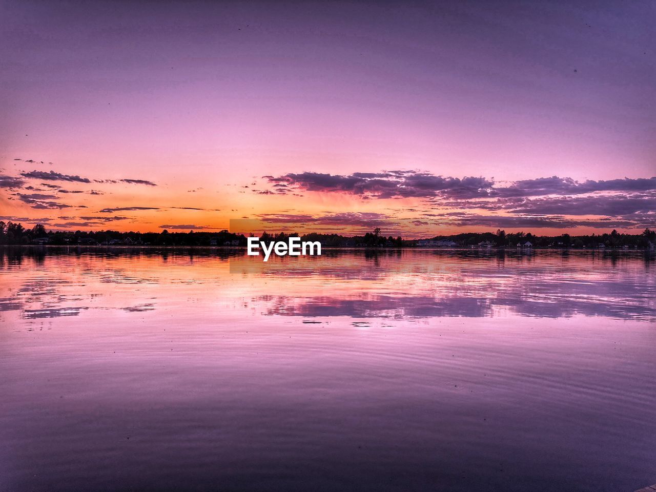 water, reflection, sky, dawn, sunset, scenics - nature, beauty in nature, tranquility, nature, cloud, landscape, environment, tranquil scene, evening, lake, pink, afterglow, no people, horizon, outdoors, idyllic, dramatic sky, travel destinations, land, orange color, red sky at morning, multi colored, lagoon, sun, travel, non-urban scene