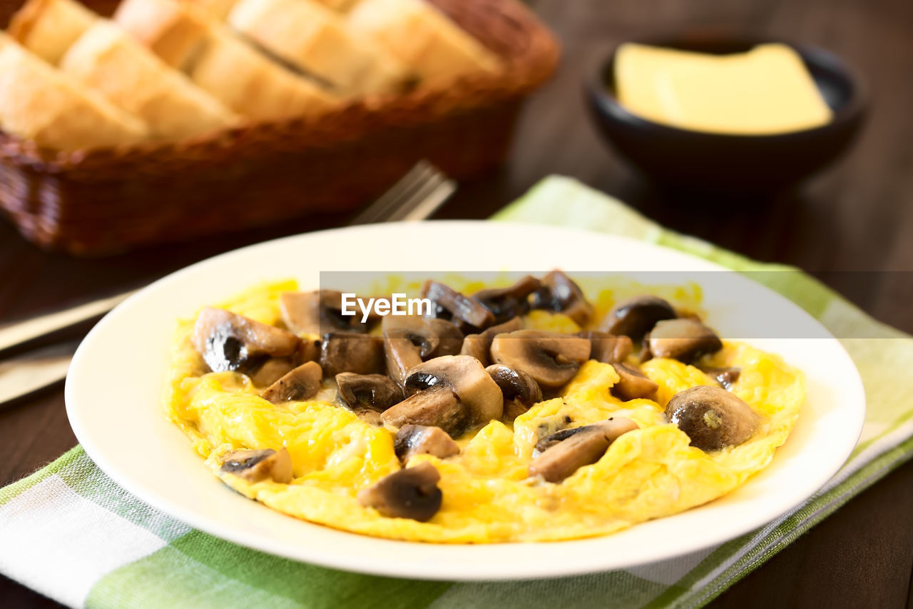 CLOSE-UP OF BREAKFAST SERVED ON TABLE