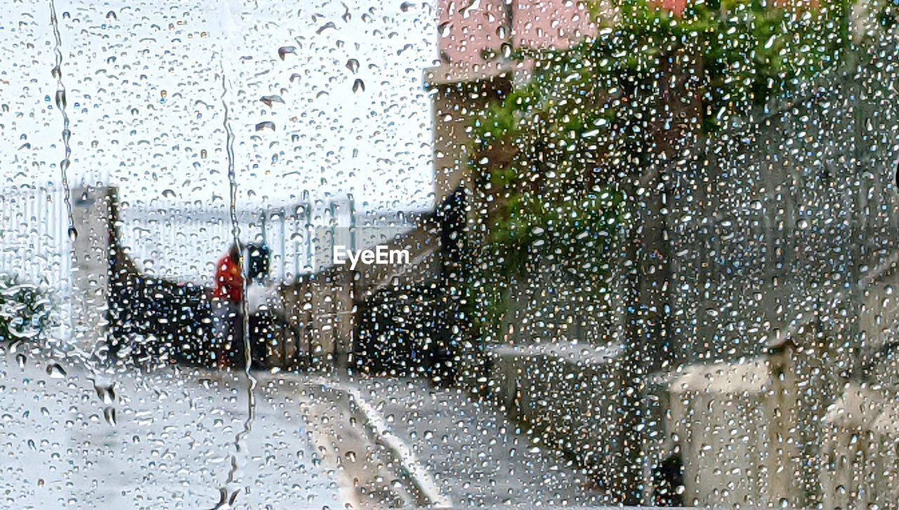 WET GLASS WINDOW DURING RAINY SEASON