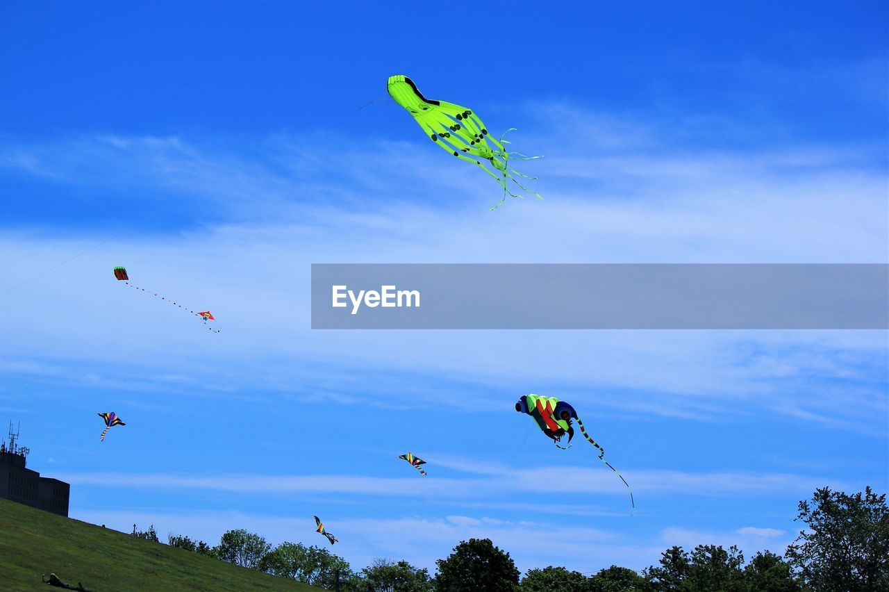 Low angle view of kite flying against sky