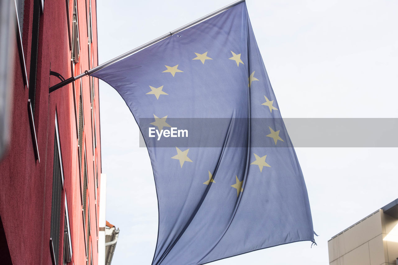 European union flag, blue flag with yellow stars representing the eu