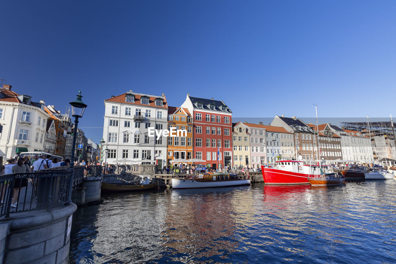 VIEW OF BUILDINGS AT WATERFRONT