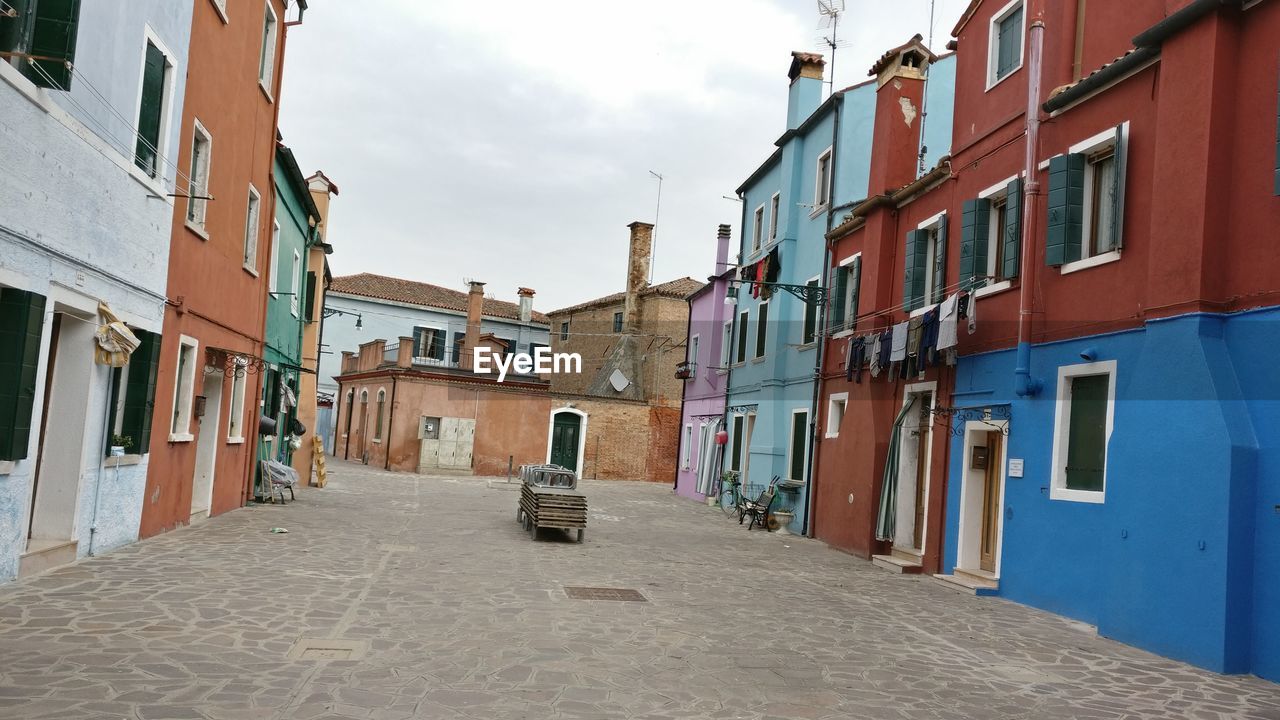 Alley amidst residential buildings