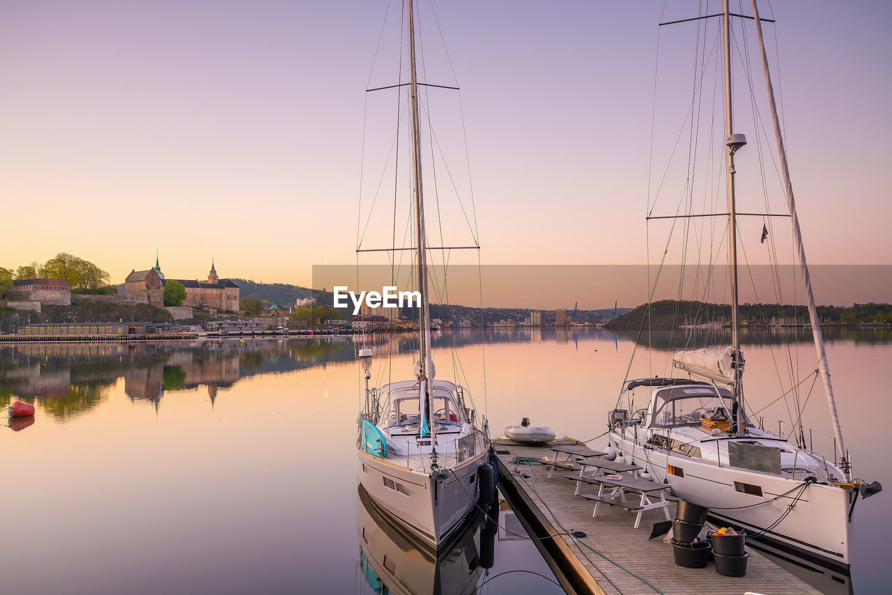 boats moored in harbor