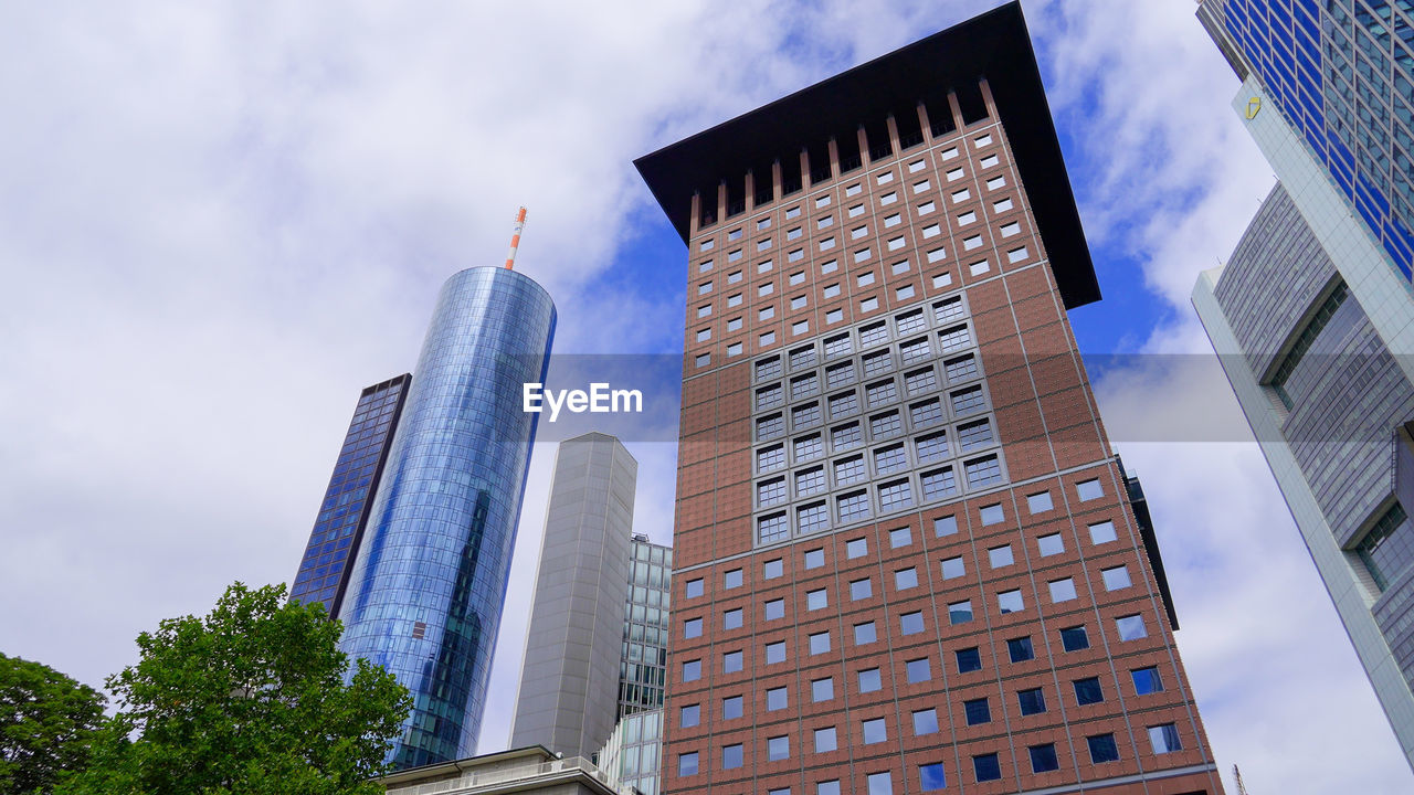 low angle view of modern buildings against sky