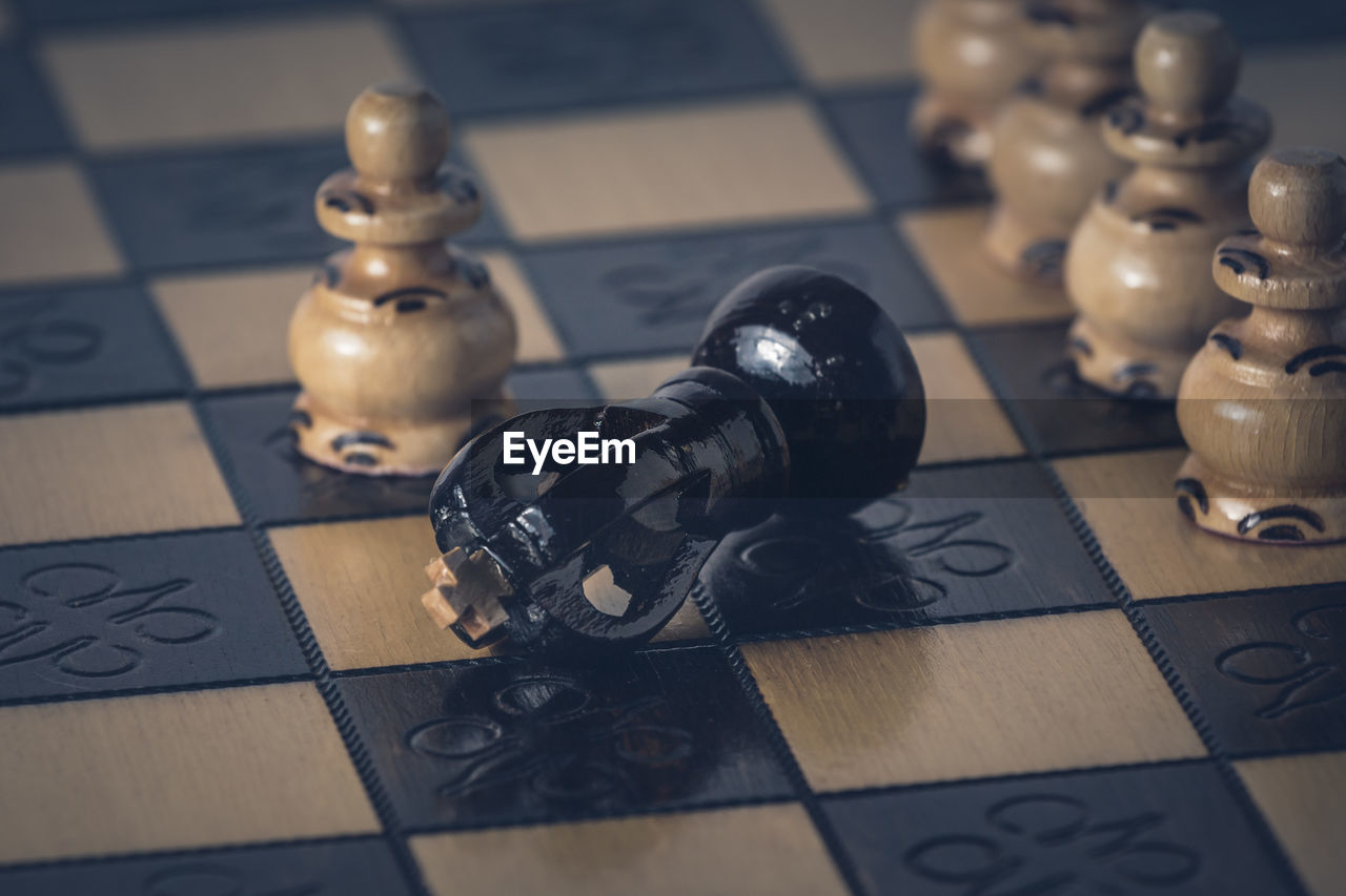 High angle view of chess pieces on table