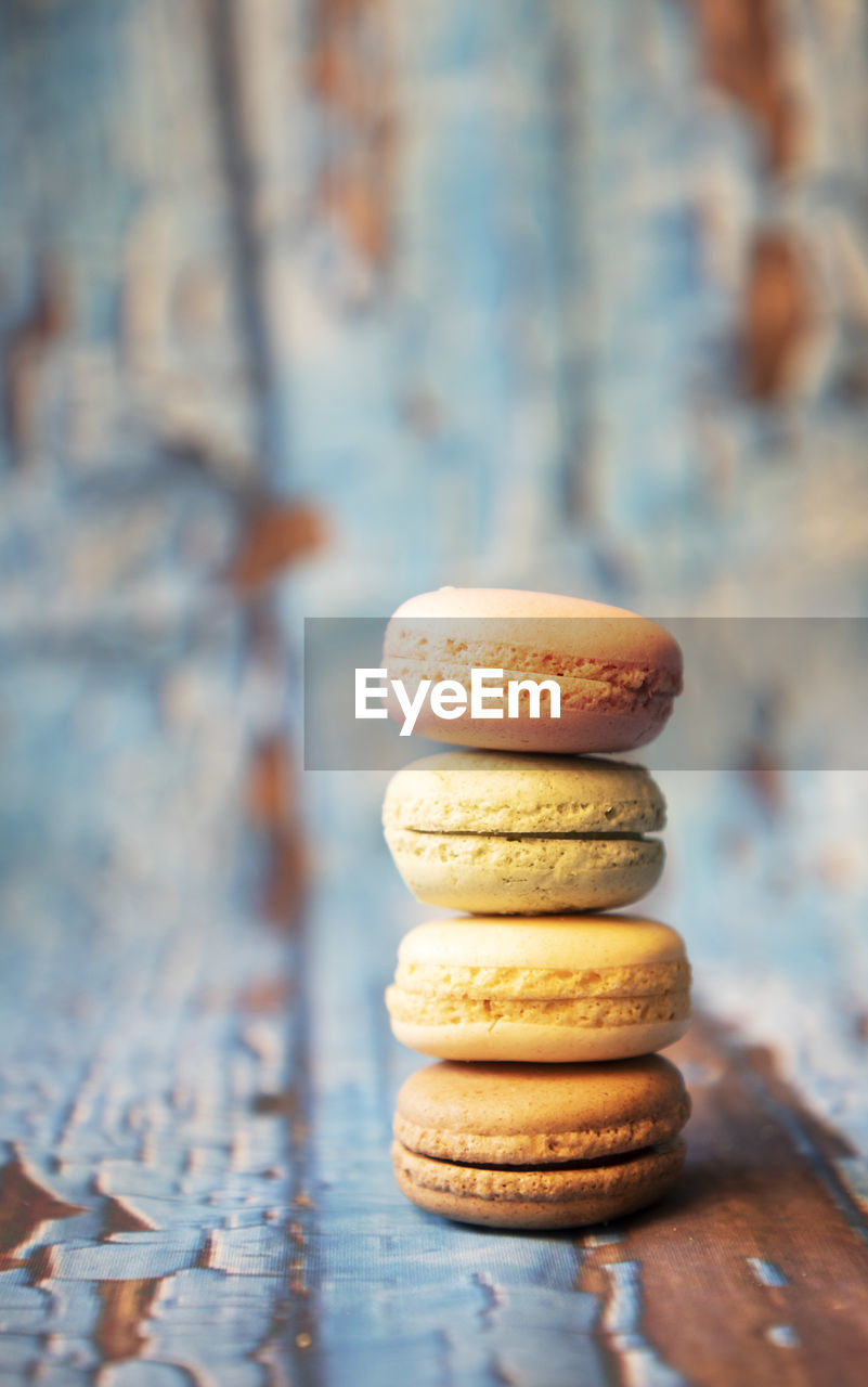 Macarons on wooden background