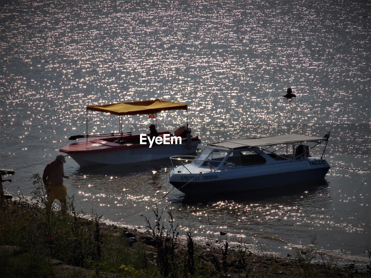 High angle view of boats moored on sea