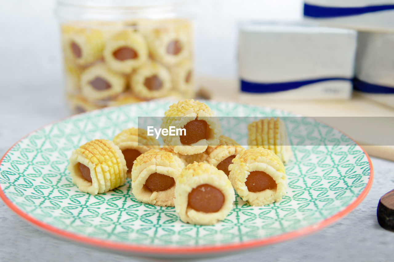 Malaysian kuih raya called tart nenas or pineapple tart. popular kuih raya on hari raya aidilfitri.