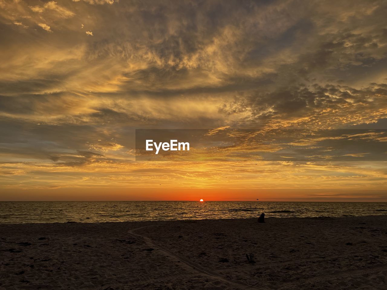 sky, sea, sunset, water, land, beach, cloud, beauty in nature, scenics - nature, horizon over water, horizon, nature, tranquility, sand, sun, environment, tranquil scene, dramatic sky, sunlight, seascape, orange color, travel destinations, ocean, landscape, afterglow, travel, coast, idyllic, holiday, outdoors, dawn, vacation, trip, body of water, no people, shore, tourism, summer, coastline, urban skyline, evening, wave, cloudscape, gold, water's edge, wind wave, non-urban scene