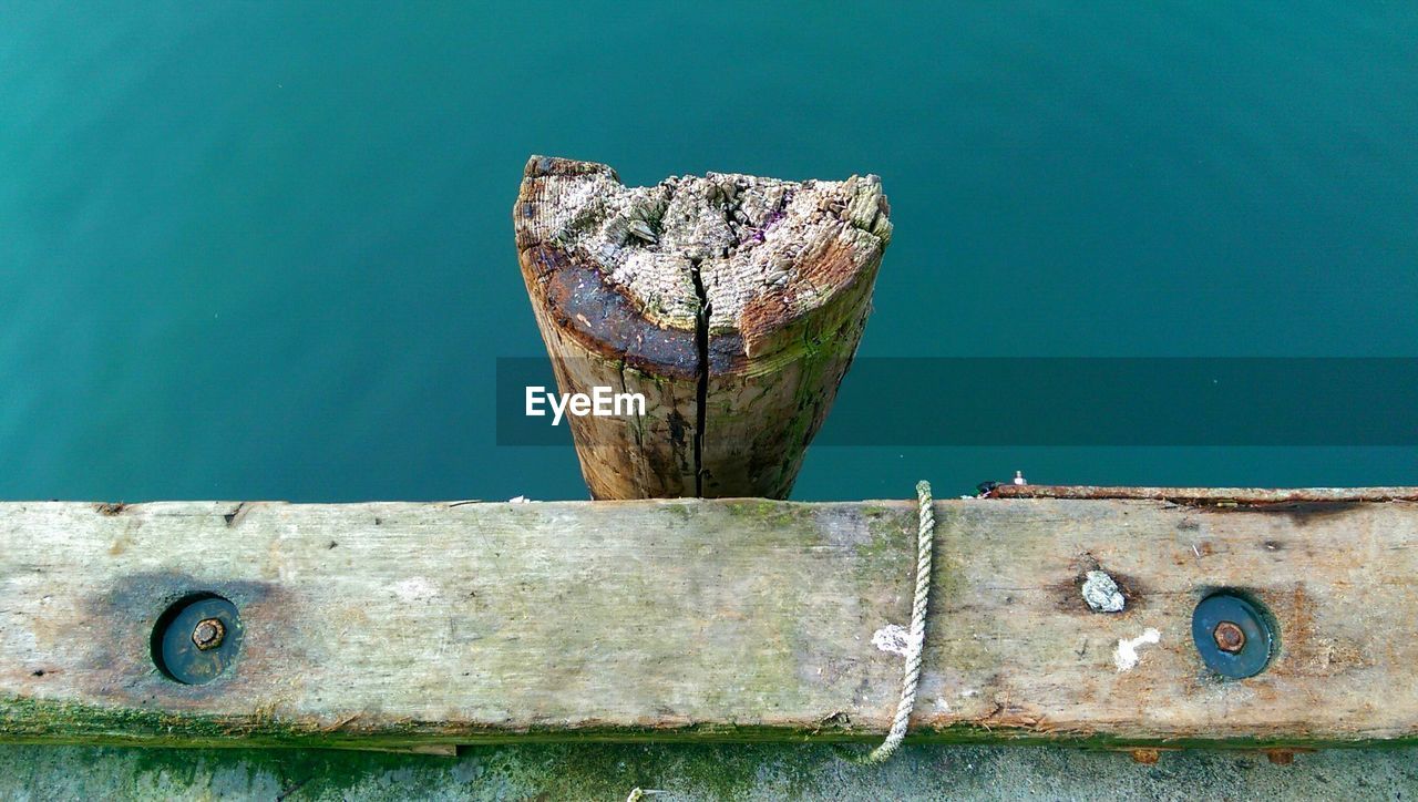 LOW ANGLE VIEW OF WOODEN WALL