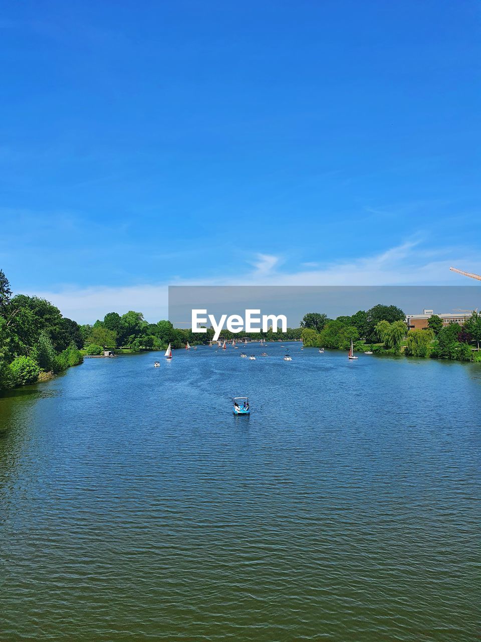 water, sky, tree, body of water, blue, nature, scenics - nature, beauty in nature, plant, reflection, nautical vessel, sea, tranquility, travel, travel destinations, shore, reservoir, transportation, tranquil scene, land, no people, day, environment, outdoors, tourism, cloud, trip, vacation, architecture, holiday, clear sky, landscape, mode of transportation, idyllic, beach, non-urban scene, waterfront, bay, summer, tropical climate