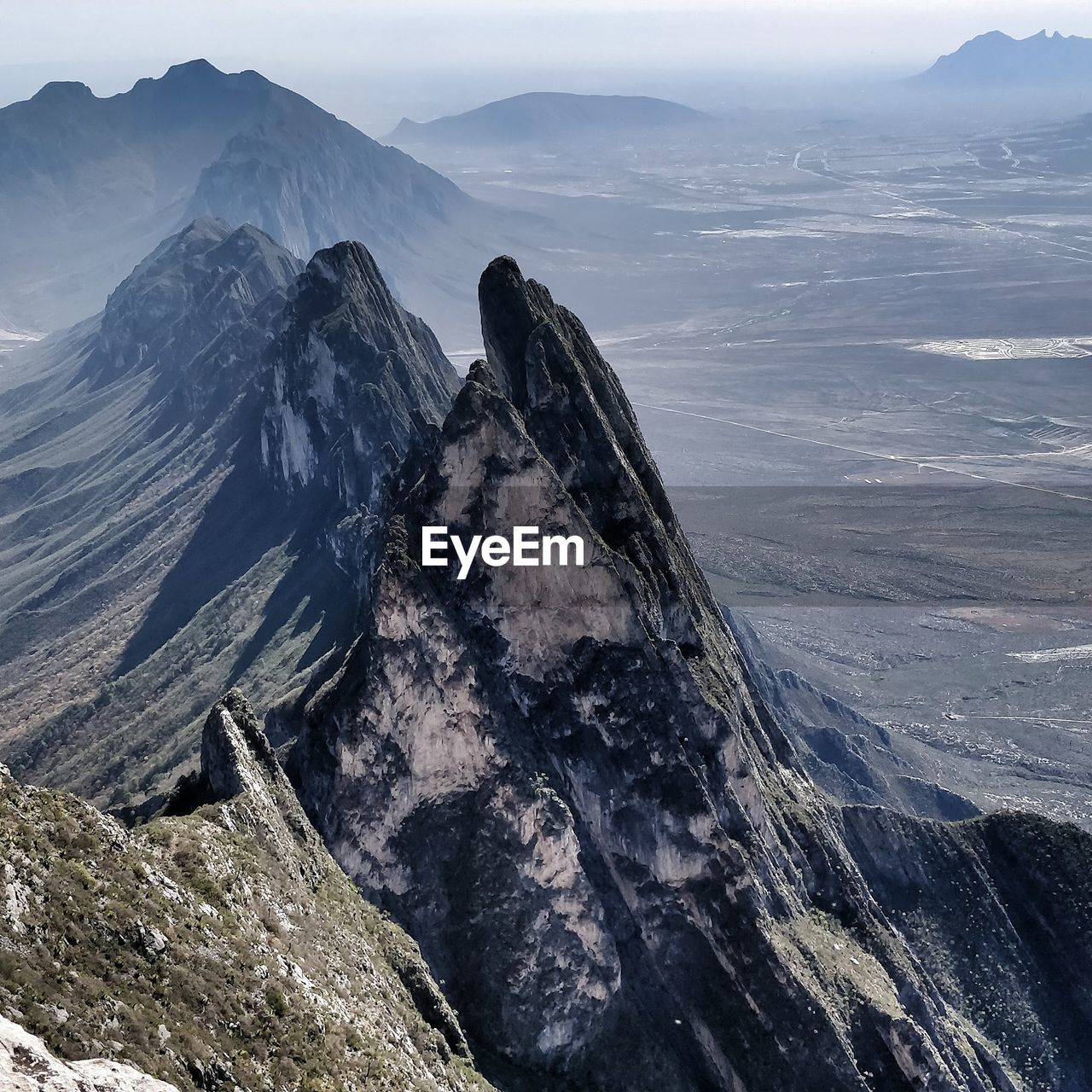 Scenic view of rock formations against sky