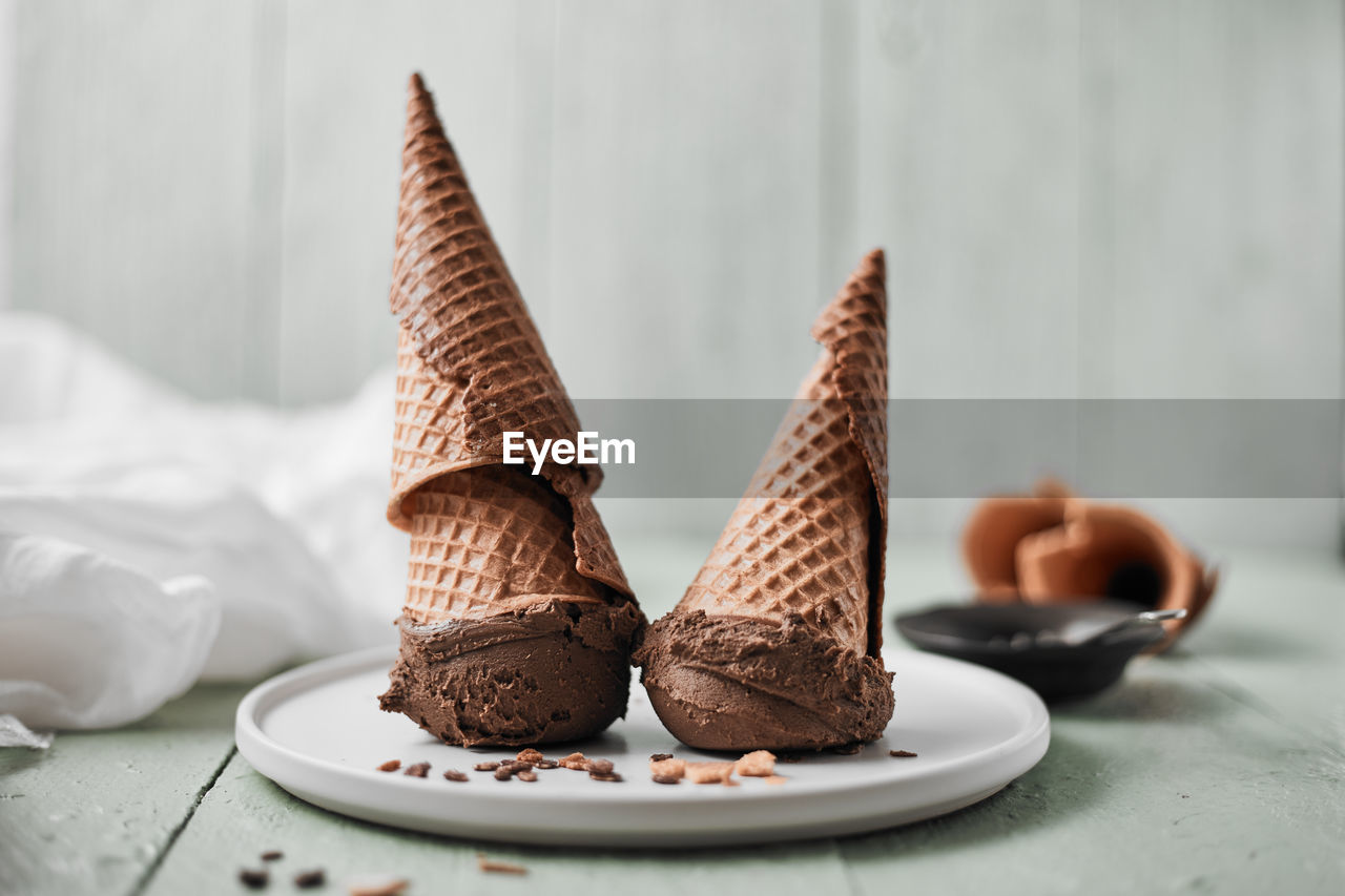 Close-up of ice cream cone on table