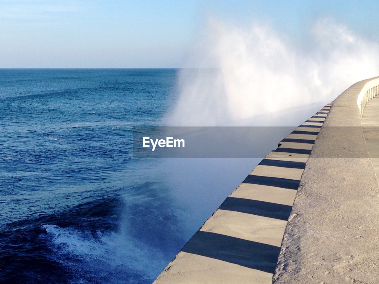 Sea water splashing on retaining wall