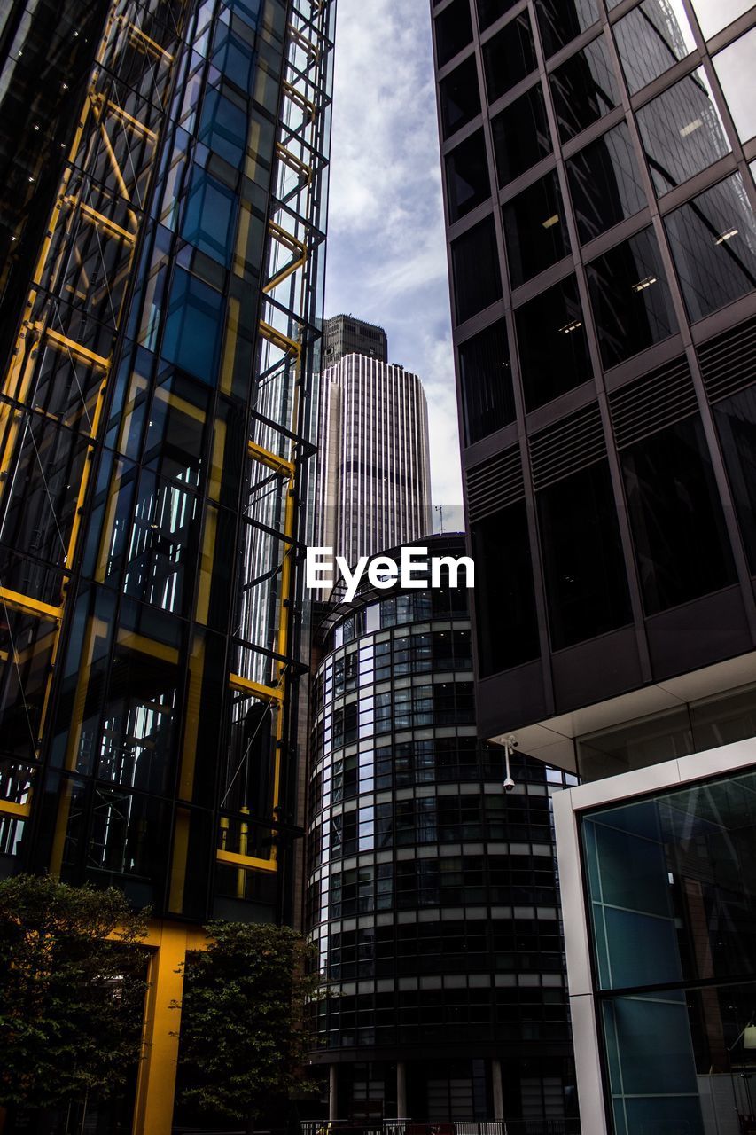 Low angle view of modern building against sky