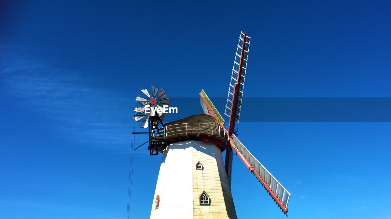 Windmill against sky