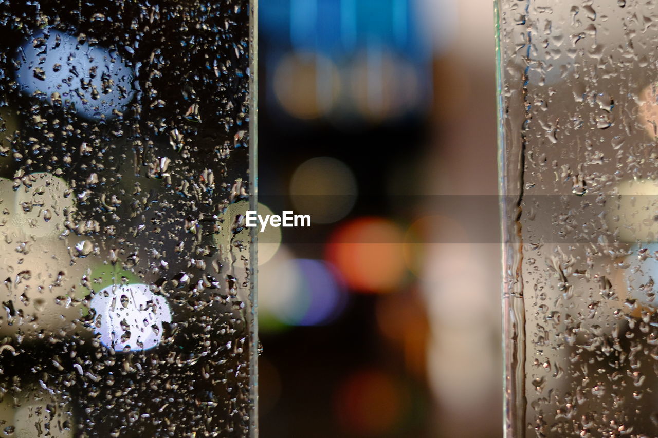 Close-up of wet glass with bokeh 