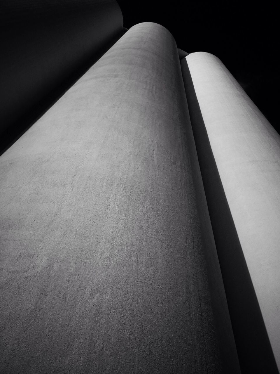 Low angle view of grain silos