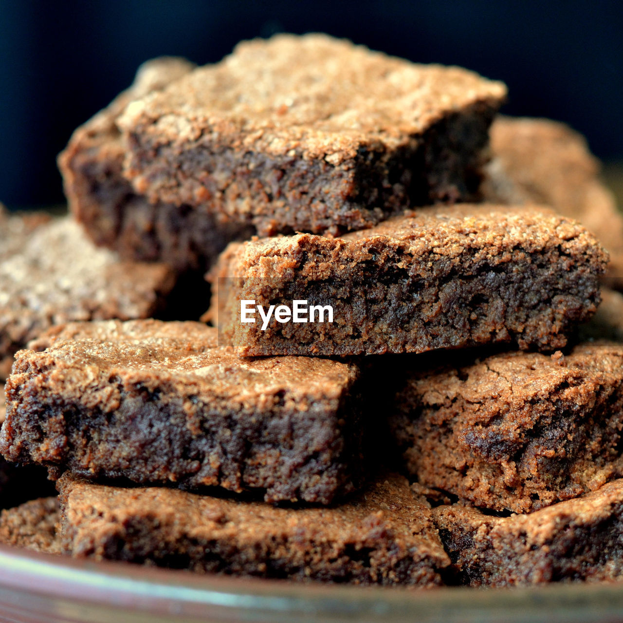 CLOSE-UP OF COOKIES ON WOOD