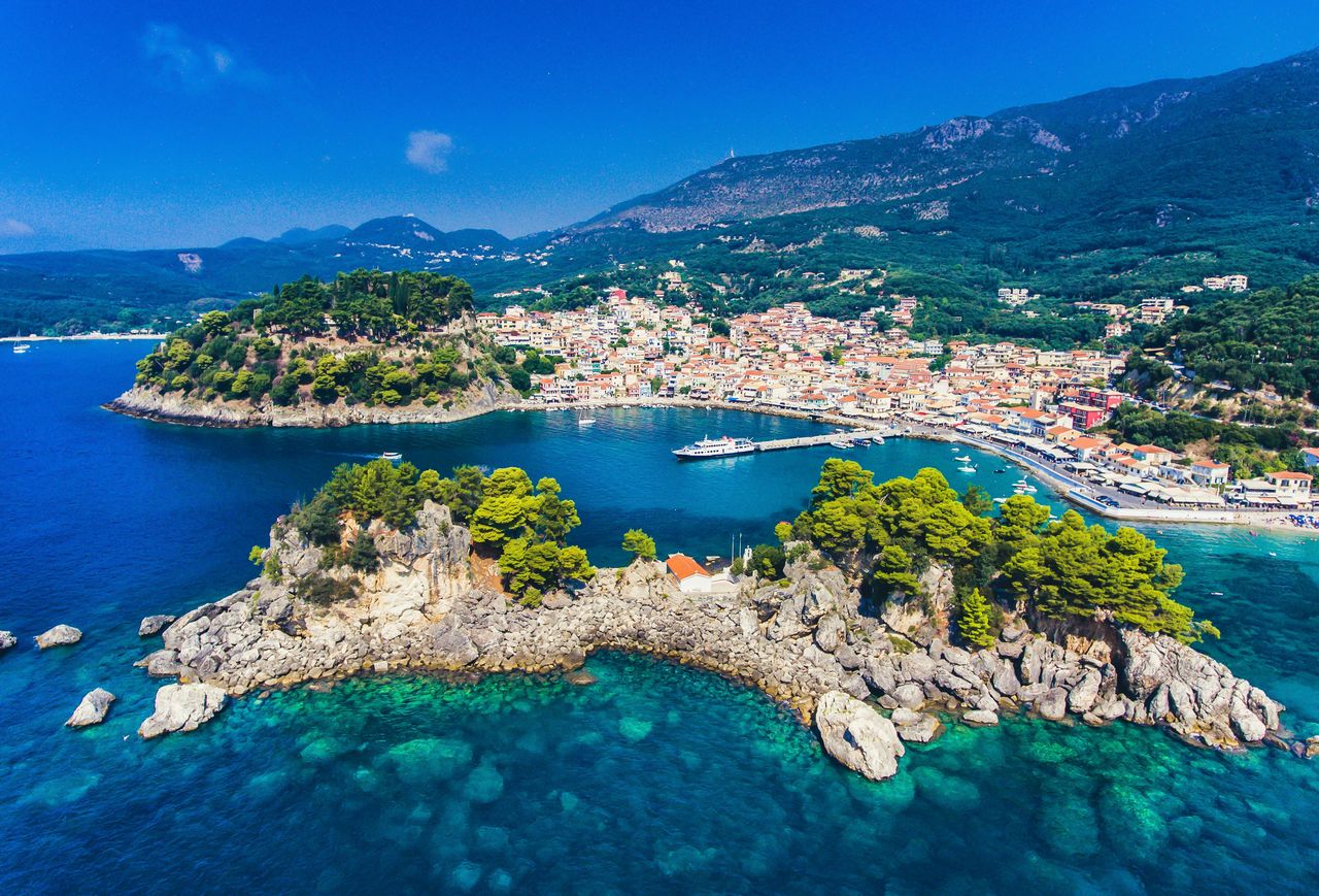 A bird's-eye perspective of the coastal town against the backdrop of the sky.  