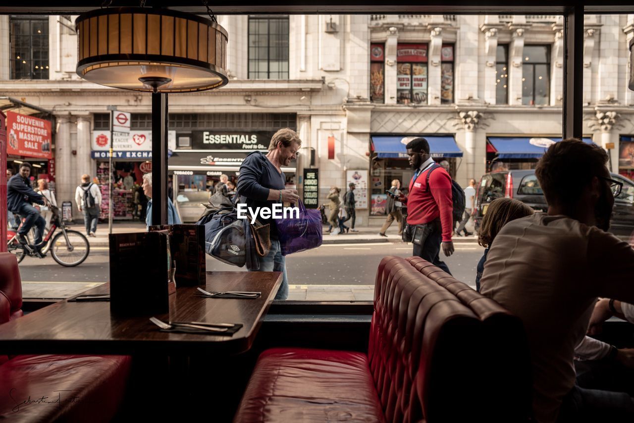 GROUP OF PEOPLE IN THE STREET