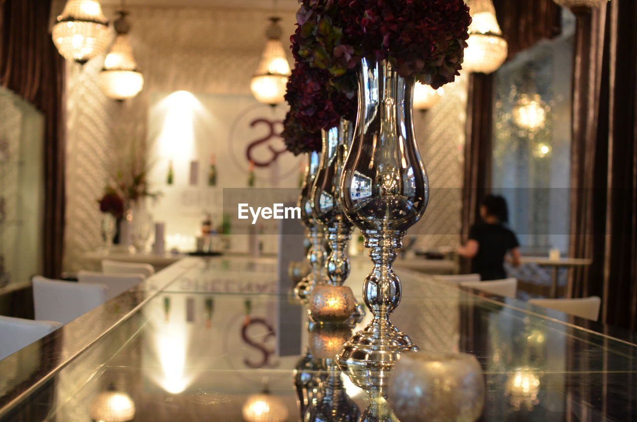 Close-up of vases on table