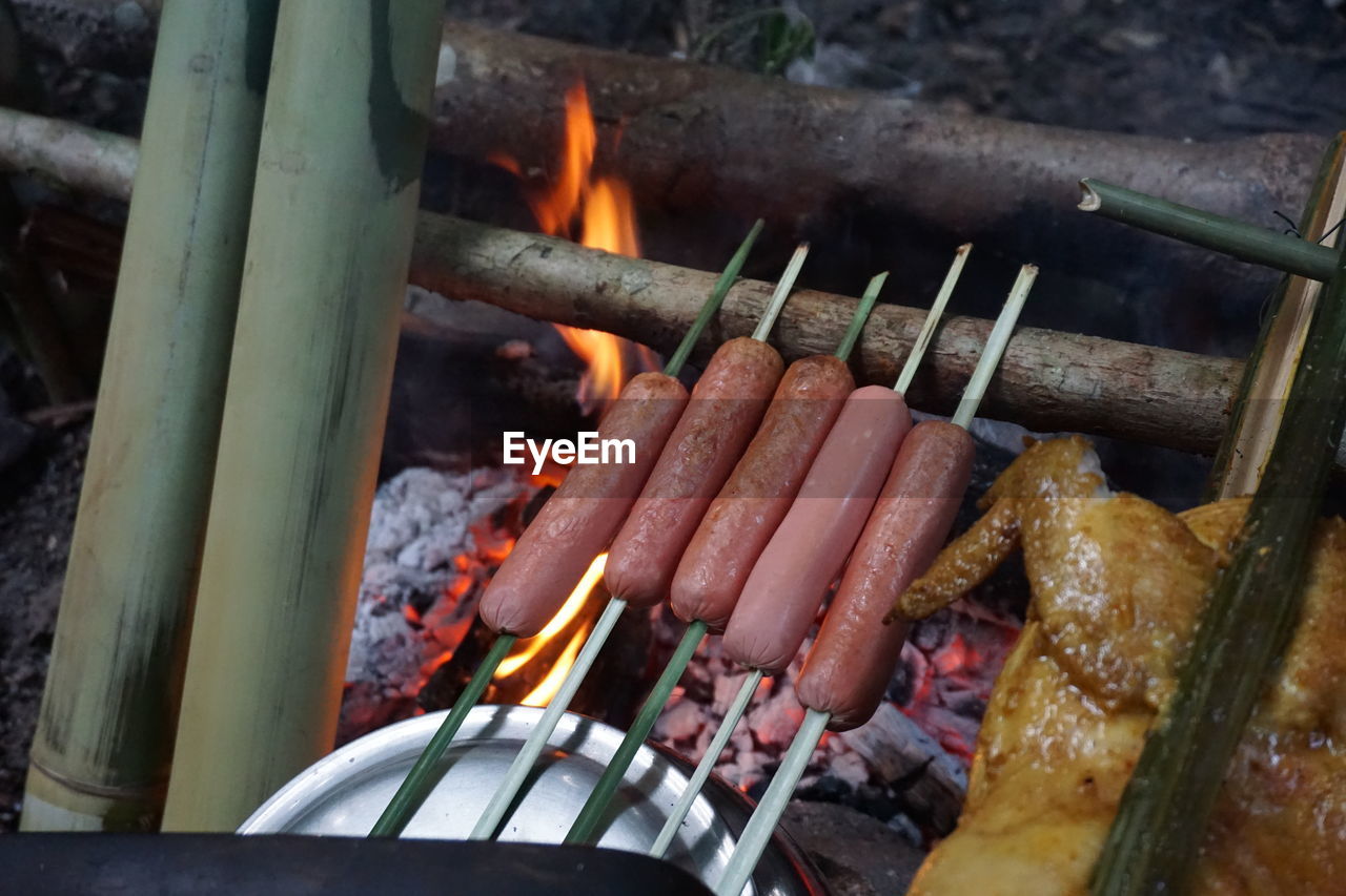 CLOSE-UP OF BONFIRE ON BARBECUE