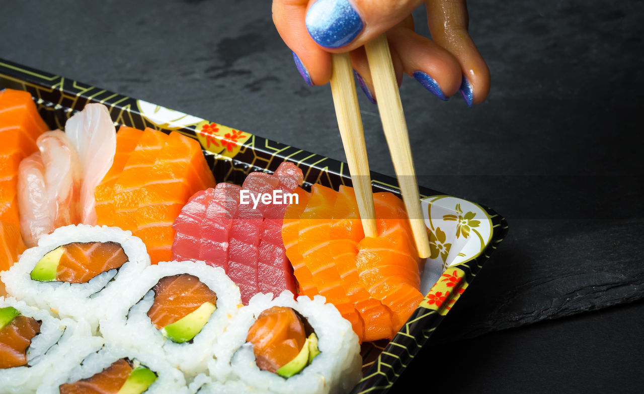 HIGH ANGLE VIEW OF SUSHI IN FISH