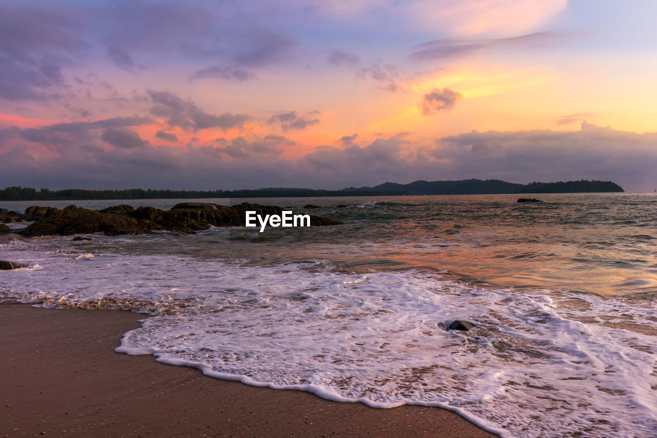Scenic view of sea against sky during sunset